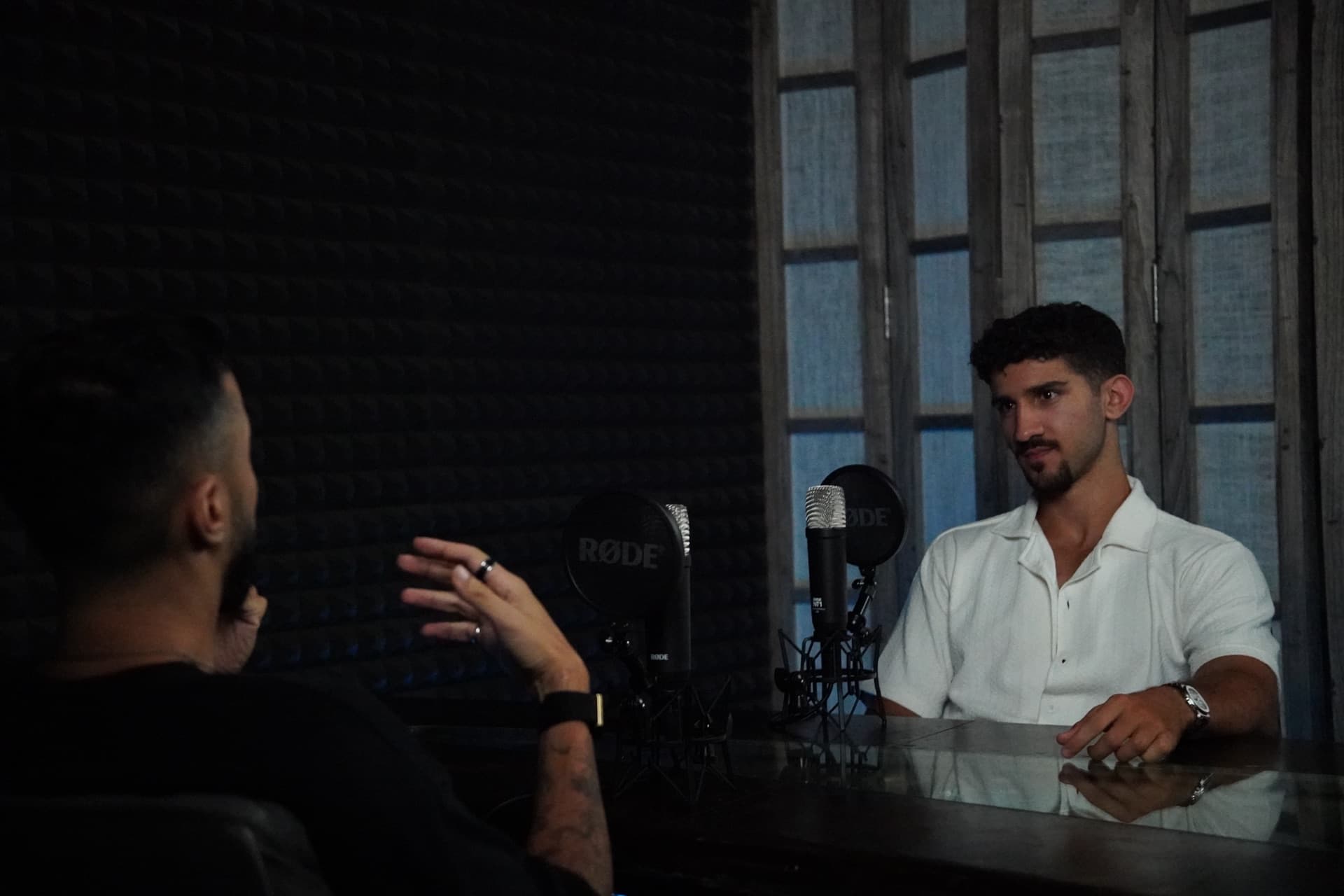 Recording an episode in the podcast studio.